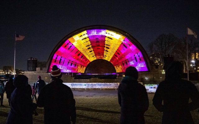 Boston Hatch Shell concert stage with bright colored projection mapping
