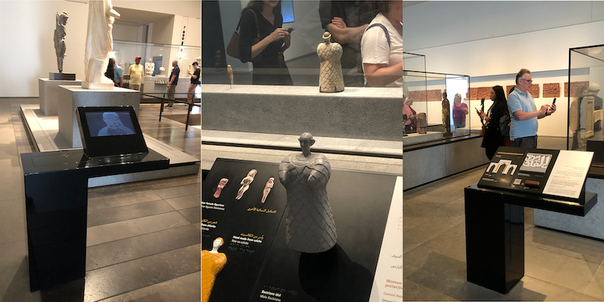 interpretives Pedestals with horizontal shelf suspended with interactives mounted on them. They are too close to the objects and in awkward positions, making them difficult to use.