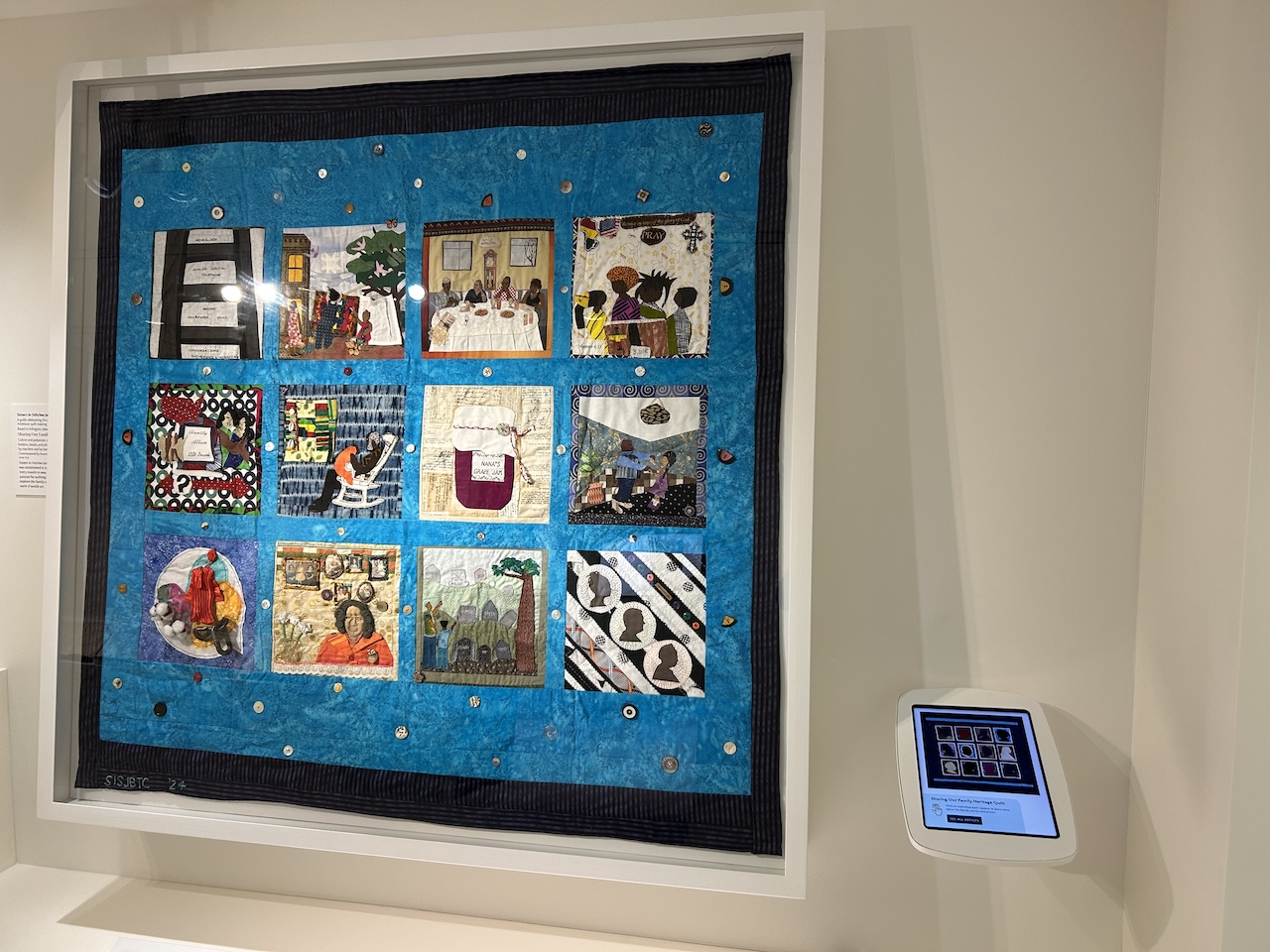 quilt Large quilt with 12 individual narrative panels and iPad interactive